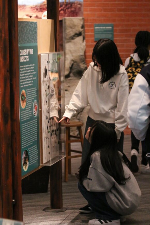 Korean students check out a science exhibit